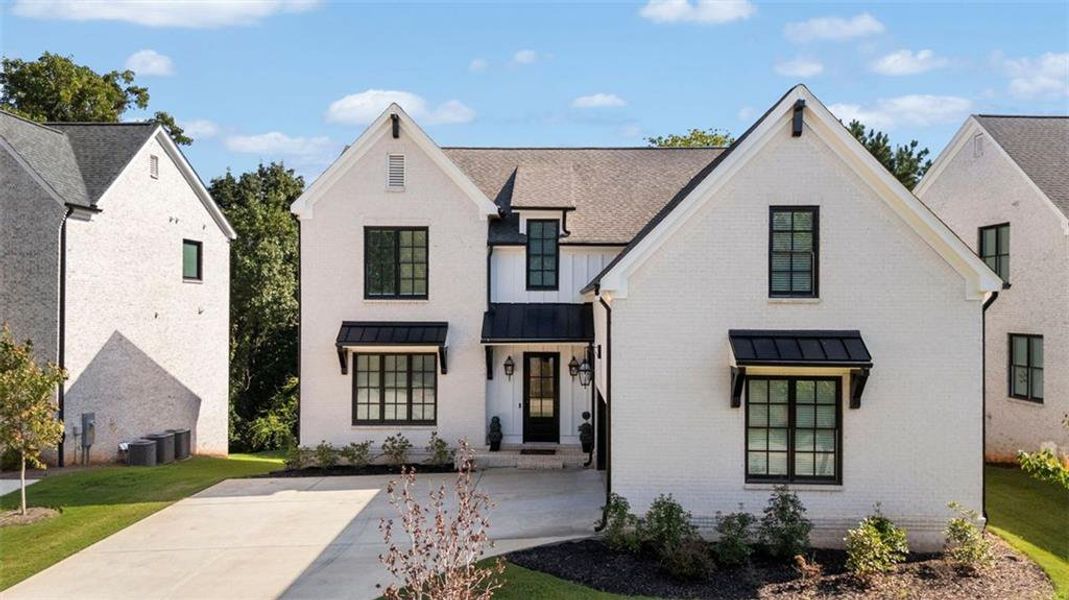 Front exterior of a new home in , Smyrna, GA, highlighting curb appeal (Image 2).