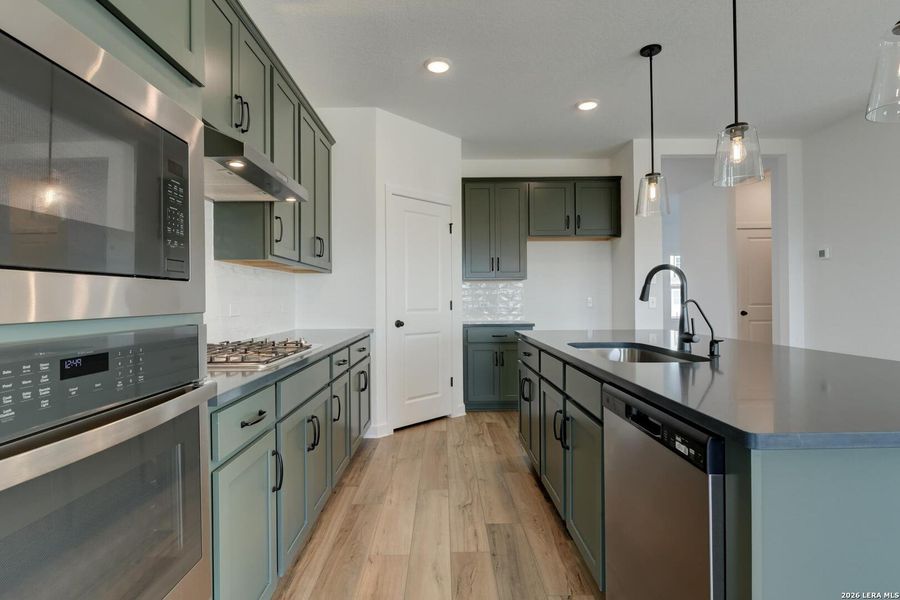 Furnished interior view inside a new home in Nopal Valley, San Antonio (Image 9).