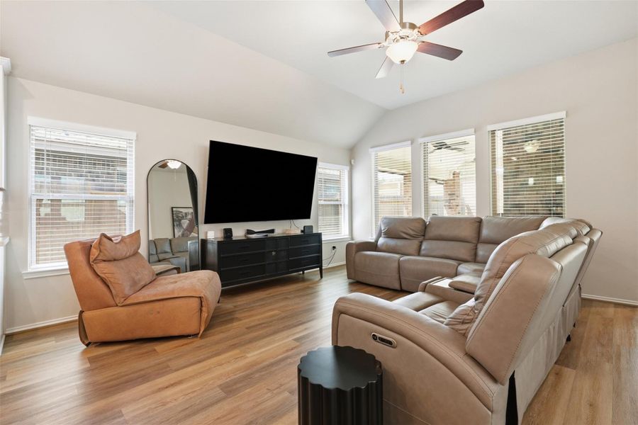 Spacious family room with soaring ceilings, abundant natural light, and an open layout designed for everyday living and effortless entertaining. Spacious family room with soaring ceilings, abundant natural light, and an open layout designed for everyday living and effortless entertaining.
