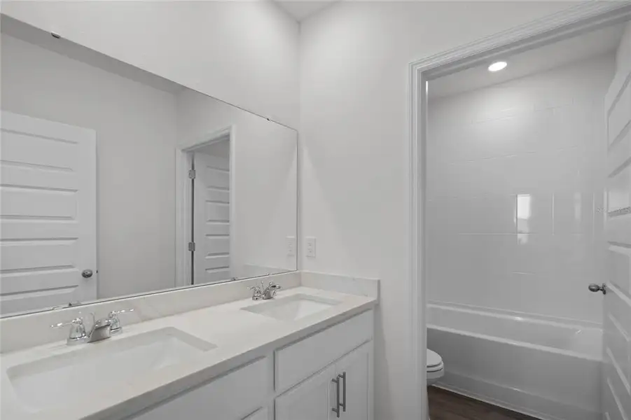 Furnished interior view inside a new home in Harmony at Lake Eloise, Winter Haven (Image 2). Furnished interior view inside a new home in Harmony at Lake Eloise, Winter Haven (Image 2).