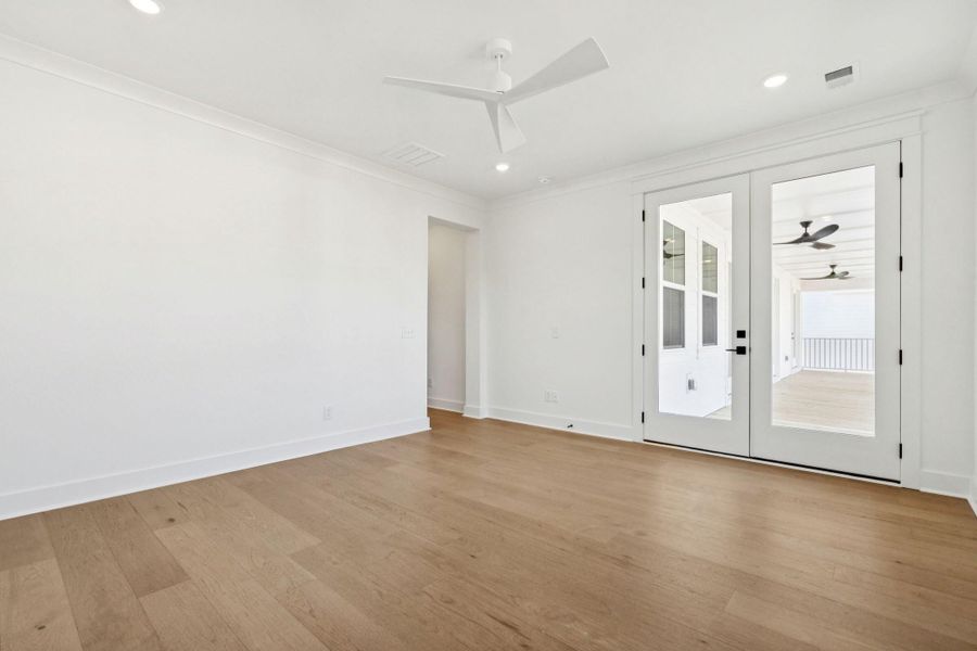 Spacious, unfurnished interior of a new home in Overlook at Copahee Sound, Awendaw (Image 59).