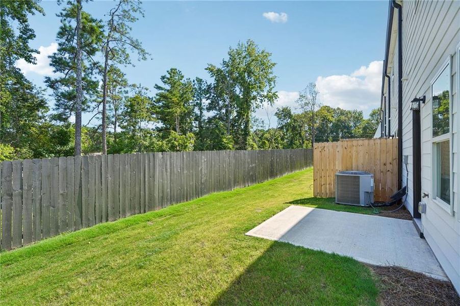 Front exterior of a new home in , Conyers, GA, highlighting curb appeal (Image 21).