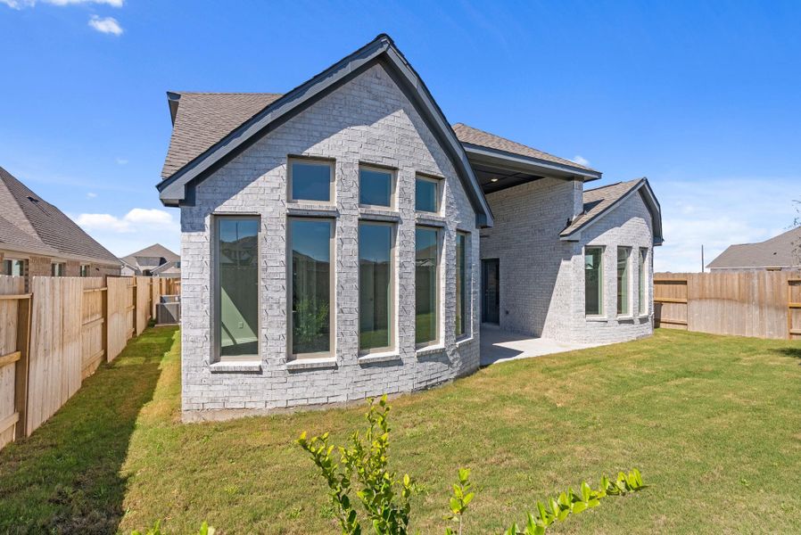 Exterior details and patio area of a home in Valencia, Manvel (Image 4). Exterior details and patio area of a home in Valencia, Manvel (Image 4).