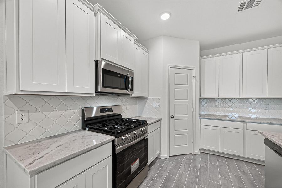 Furnished interior view inside a new home in Rollingbrook Estates, Baytown (Image 12).