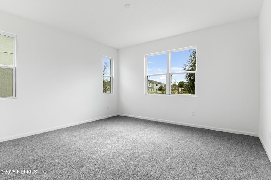 Spacious, unfurnished interior of a new home in Seasons at Grandview Gardens, Deland (Image 13).