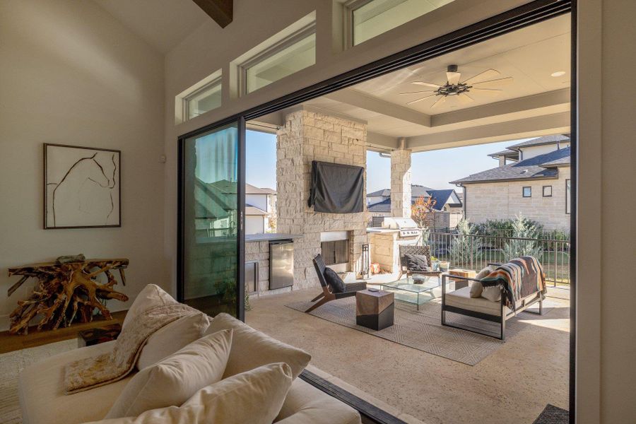 Covered outdoor living extends the home’s entertaining potential, creating a comfortable space for year-round enjoyment.