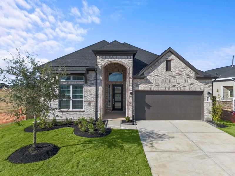 Front exterior of a new home in Attwater, Waller, TX, highlighting curb appeal (Image 25).