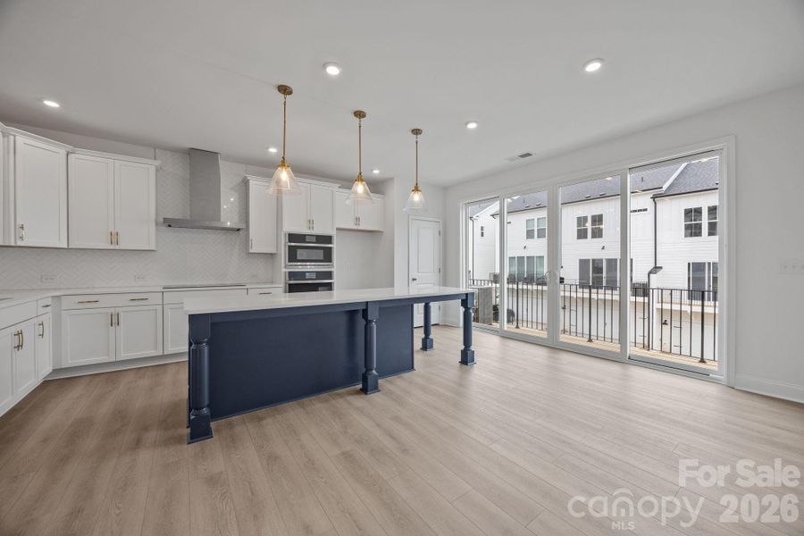 Furnished interior view inside a new home in The River District Townhomes, Charlotte (Image 3).