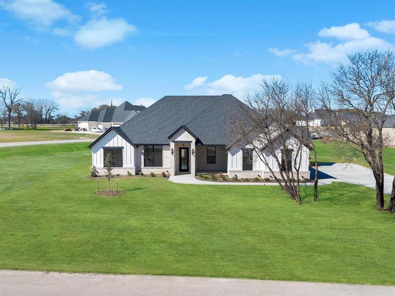 Front exterior of a new home in , Weatherford, TX, highlighting curb appeal (Image 22). Front exterior of a new home in , Weatherford, TX, highlighting curb appeal (Image 22).