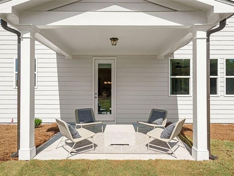Exterior details and patio area of a home in Wehunt Meadows, Hoschton (Image 3).
