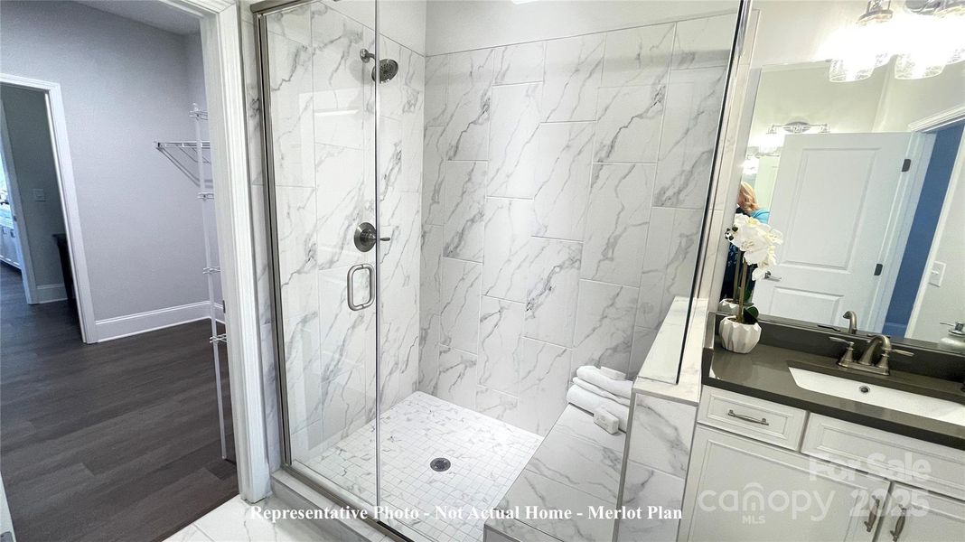 Main Bath glass enclosure and tiled bench shower Example-Merlot Floorplan