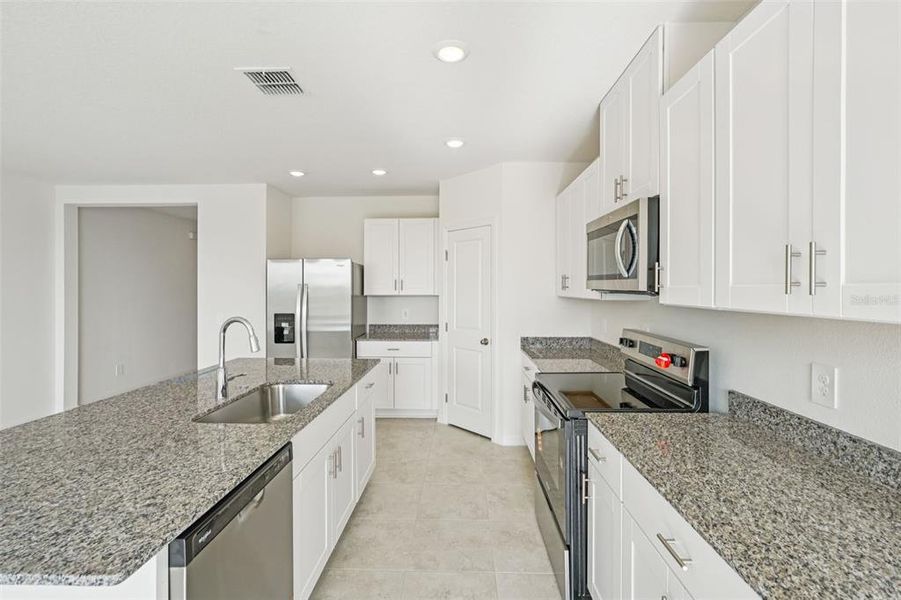 Furnished interior view inside a new home in Crosswinds - Signature Series, Haines City (Image 7).