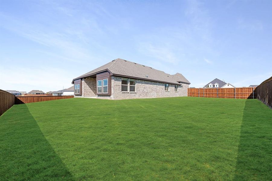 Exterior details and patio area of a home in Wildcat Ridge Phase 2 and 4, Godley (Image 23).