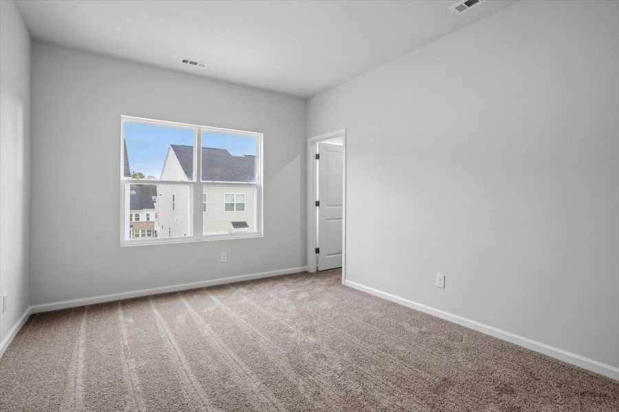 Spacious, unfurnished interior of a new home in Renaissance at White Oak, Garner (Image 16).