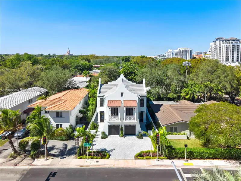 Front exterior of a new home in , Coral Gables, FL, highlighting curb appeal (Image 22).
