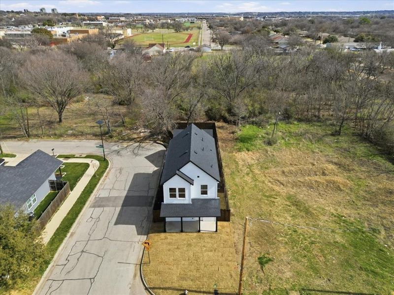 Prime corner lot backing to green space with added privacy. Modern farmhouse design in a peaceful setting close to schools and amenities.