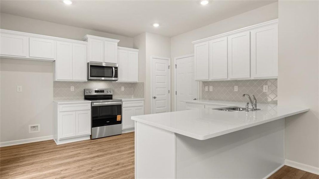 Furnished interior view inside a new home in Willowbrook, Winder (Image 9).