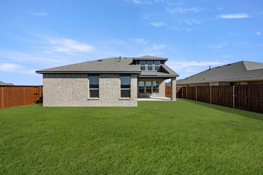 Front exterior of a new home in Myrtle Creek, Waxahachie, TX, highlighting curb appeal (Image 28). Front exterior of a new home in Myrtle Creek, Waxahachie, TX, highlighting curb appeal (Image 28).
