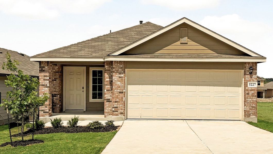 Front exterior of a new home in Stonehill, San Antonio, TX, highlighting curb appeal (Image 1). Front exterior of a new home in Stonehill, San Antonio, TX, highlighting curb appeal (Image 1).