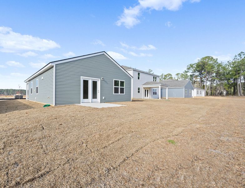 Exterior details and patio area of a home in Bradford Pointe, Summerville (Image 3).