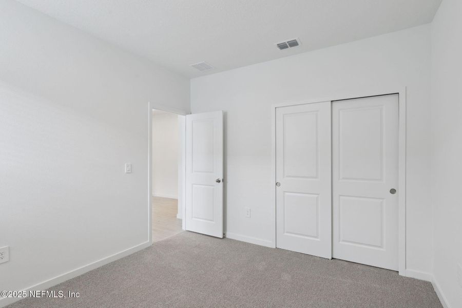 Spacious, unfurnished interior of a new home in Cypress Meadows - Signature Series, Jacksonville (Image 25).