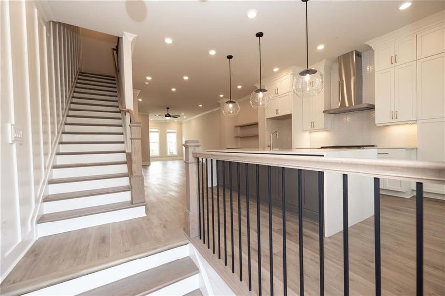 Front door entry into open concept main level living space.