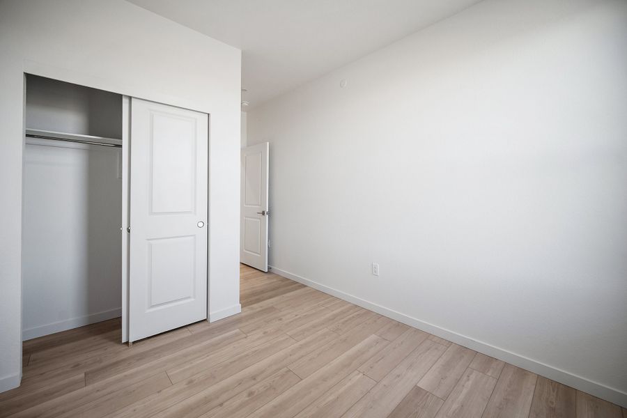 Spacious, unfurnished interior of a new home in Lyric at RidgeGate Condos, Lone Tree (Image 16).