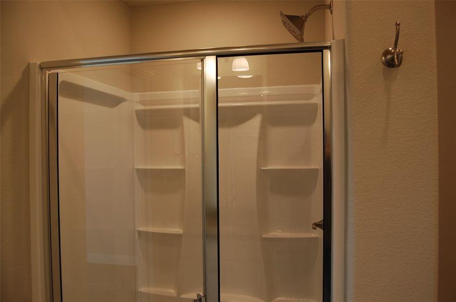 Bathroom featuring an enclosed shower