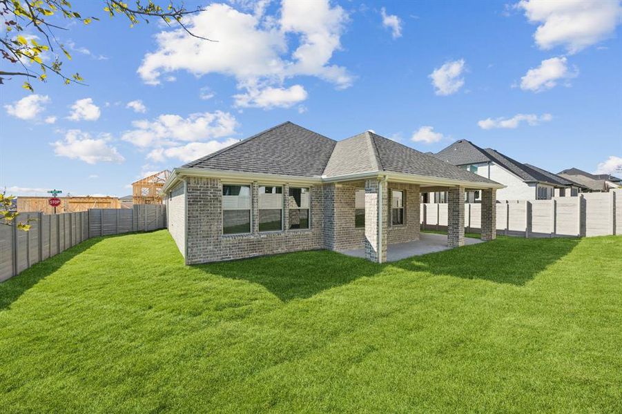 Exterior details and patio area of a home in Painted Tree - Woodland West, McKinney (Image 2).