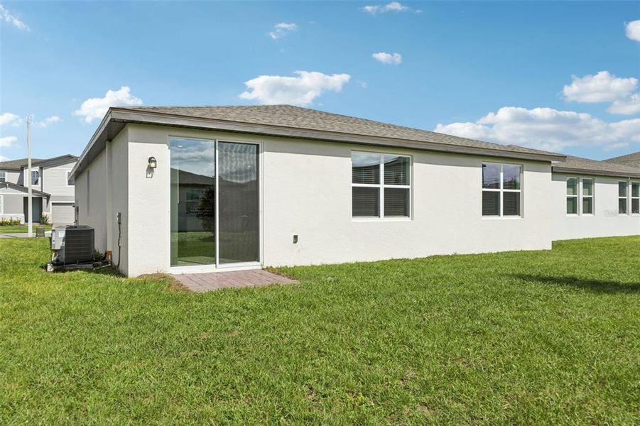 Exterior details and patio area of a home in Lawson Dunes - Signature Series, Haines City (Image 23). Exterior details and patio area of a home in Lawson Dunes - Signature Series, Haines City (Image 23).