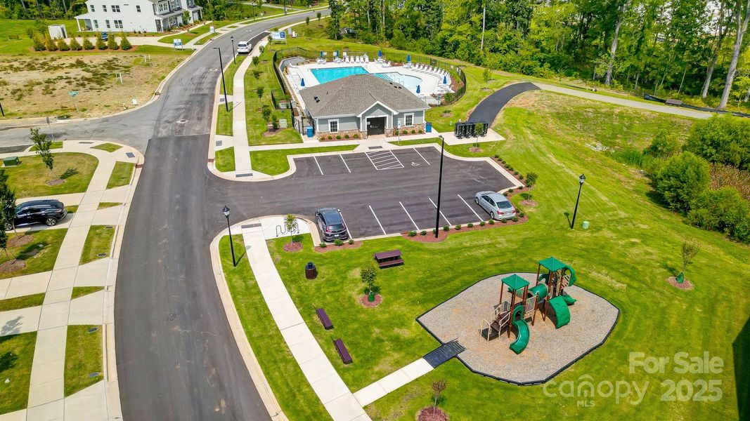 Aerial shots of the pool and playground.