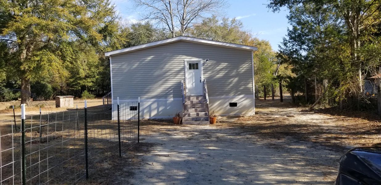 Exterior details and patio area of a home in , Varnville (Image 16).