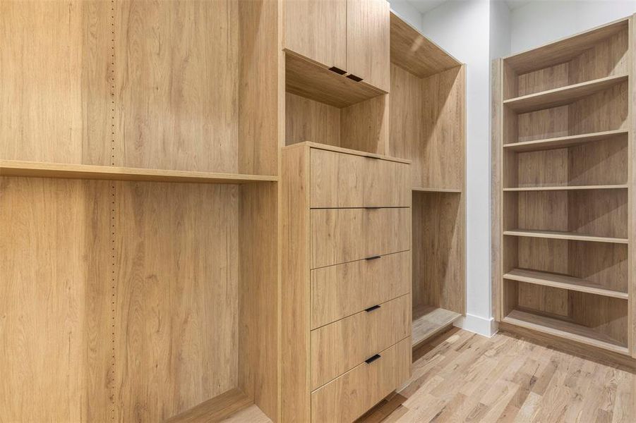 Primary closet with custom built ins Primary closet with custom built ins