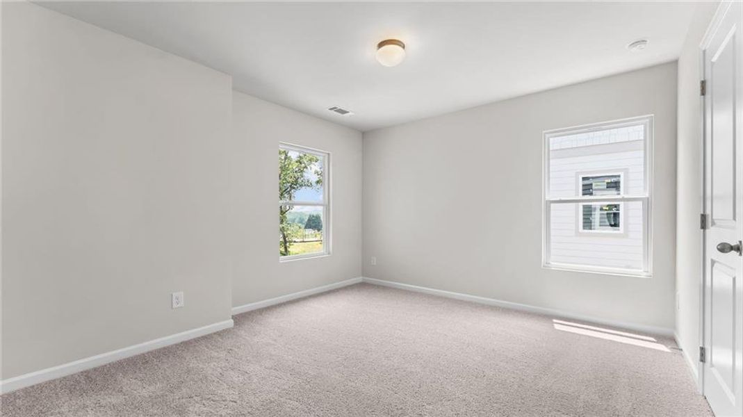 Spacious, unfurnished interior of a new home in Magnolia Trace, Flowery Branch (Image 9).