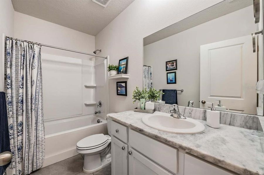 Furnished interior view inside a new home in Azalea Shores, Largo (Image 13).