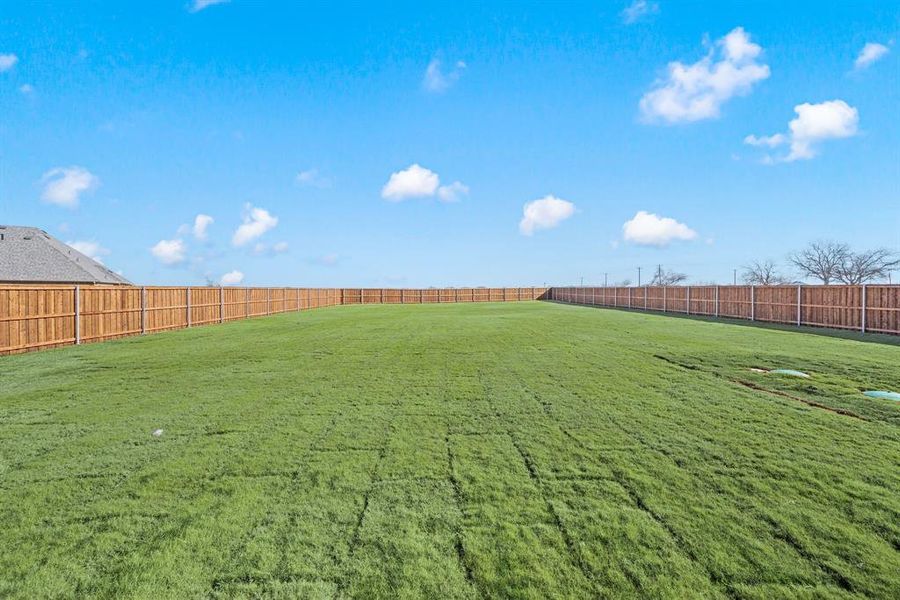 Exterior details and patio area of a home in Settlers Glen, New Fairview (Image 25).