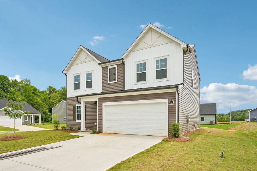 Front exterior of a new home in Middleton Farms, Middlesex, NC, highlighting curb appeal (Image 2). Front exterior of a new home in Middleton Farms, Middlesex, NC, highlighting curb appeal (Image 2).