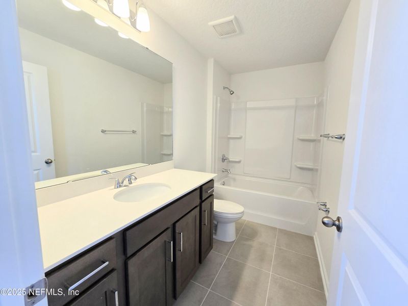Furnished interior view inside a new home in Hyland Trail, Green Cove Springs (Image 8).