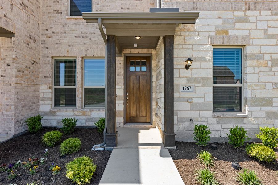 Front exterior of a new home in Timber Ridge, Corinth, TX, highlighting curb appeal (Image 29). Front exterior of a new home in Timber Ridge, Corinth, TX, highlighting curb appeal (Image 29).