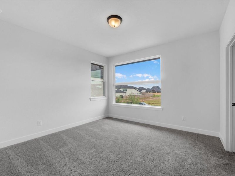 Spacious, unfurnished interior of a new home in Harvest Green, Richmond (Image 11).