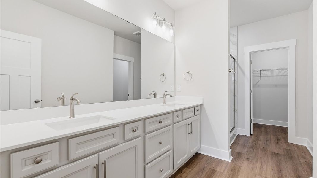 Exceptional en-suite with dual vanity and glass-enclosed walk-in shower for superior everyday comfort near Downtown Anderson Exceptional en-suite with dual vanity and glass-enclosed walk-in shower for superior everyday comfort near Downtown Anderson