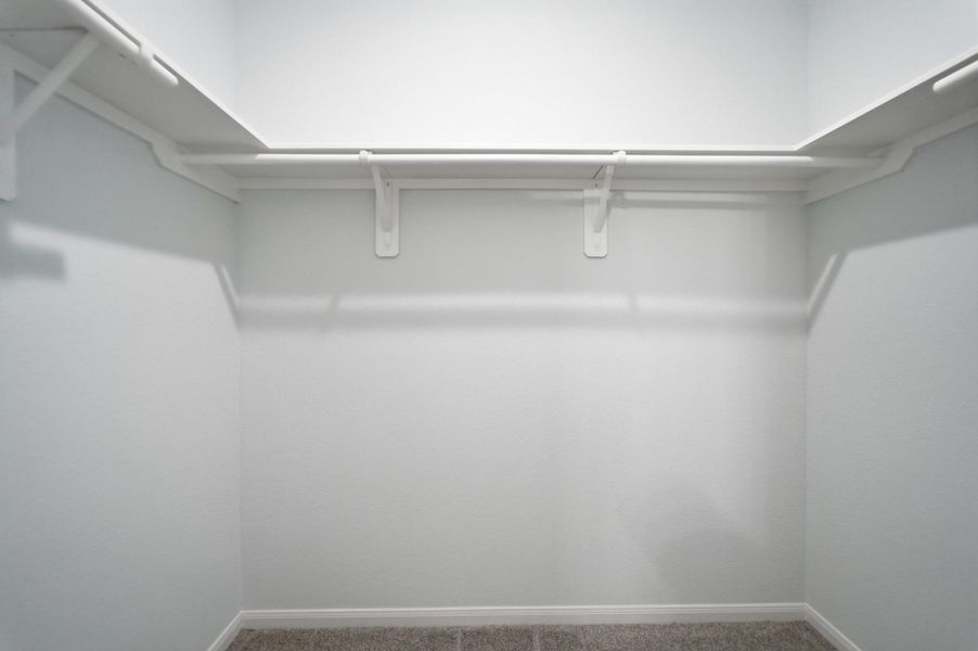 Spacious, unfurnished interior of a new home in The Pines at Seven Coves, Willis (Image 17).