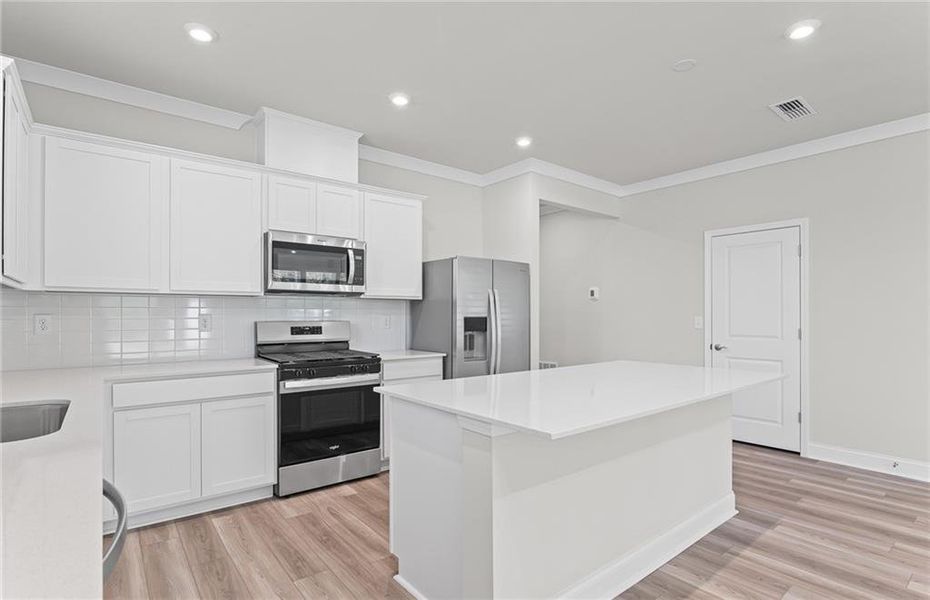 Furnished interior view inside a new home in Overland, Locust Grove (Image 6).