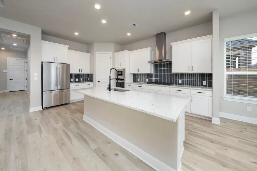 Furnished interior view inside a new home in Sierra Vista, Iowa Colony (Image 4).