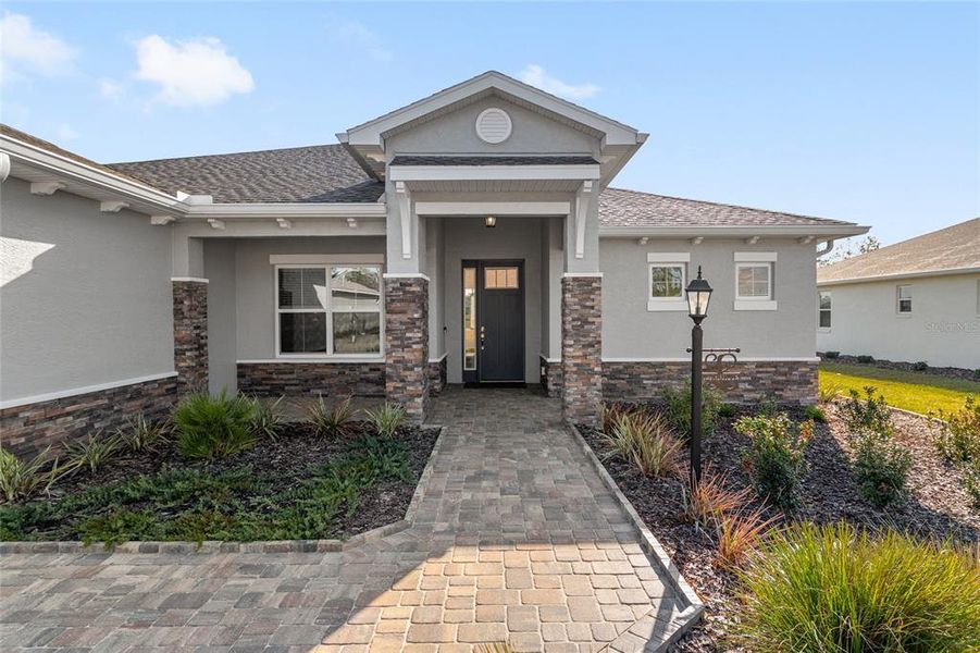 Front exterior of a new home in , Ocala, FL, highlighting curb appeal (Image 25).