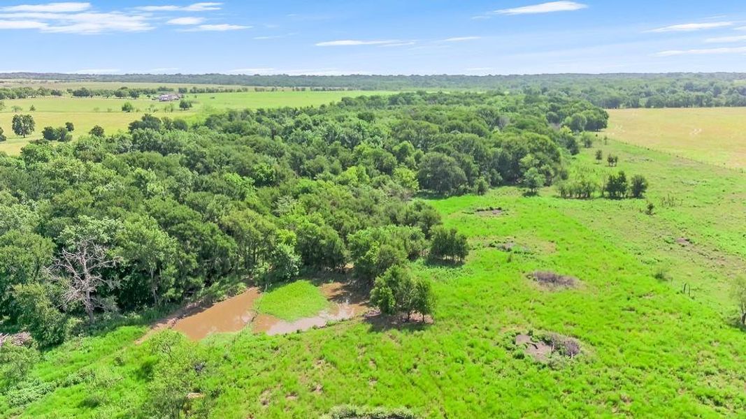 View of rural area and pond View of rural area and pond