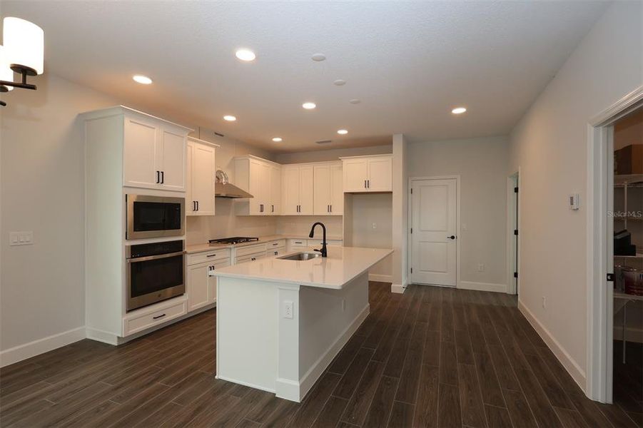 Furnished interior view inside a new home in Lake Star at Ovation, Winter Garden (Image 8).