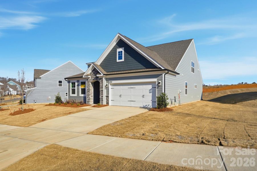 Front exterior of a new home in Carrington, Stanley, NC, highlighting curb appeal (Image 25).