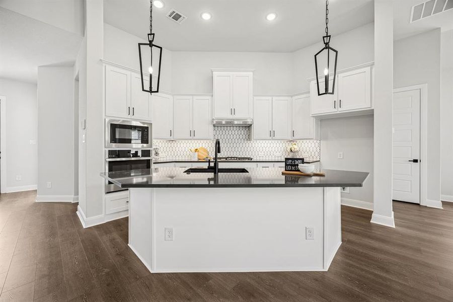 Furnished interior view inside a new home in Elements at Viridian - Garden Series, Arlington (Image 5). Furnished interior view inside a new home in Elements at Viridian - Garden Series, Arlington (Image 5).