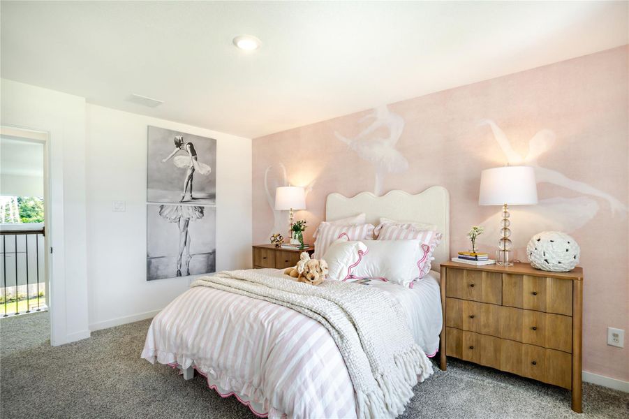 This cozy bedroom features a soft, pink ballet-themed design with elegant wall art and plush bedding. It includes two wooden nightstands with modern lamps, creating a warm and inviting atmosphere. This cozy bedroom features a soft, pink ballet-themed design with elegant wall art and plush bedding. It includes two wooden nightstands with modern lamps, creating a warm and inviting atmosphere.
